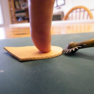 Marking side panel during a workshop at The Falconry School