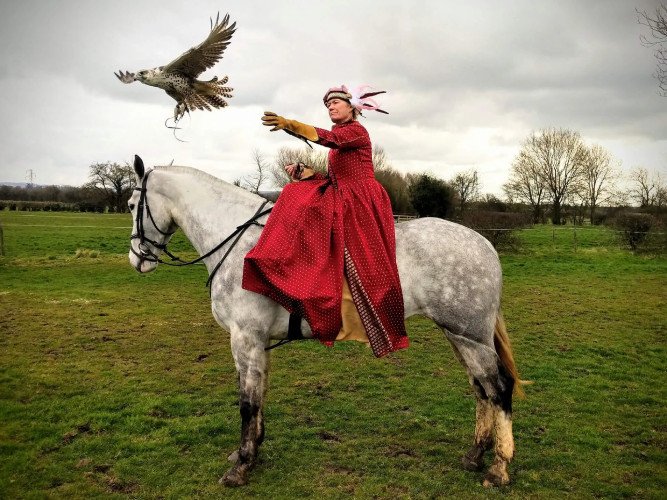 Falconry lady on horseback